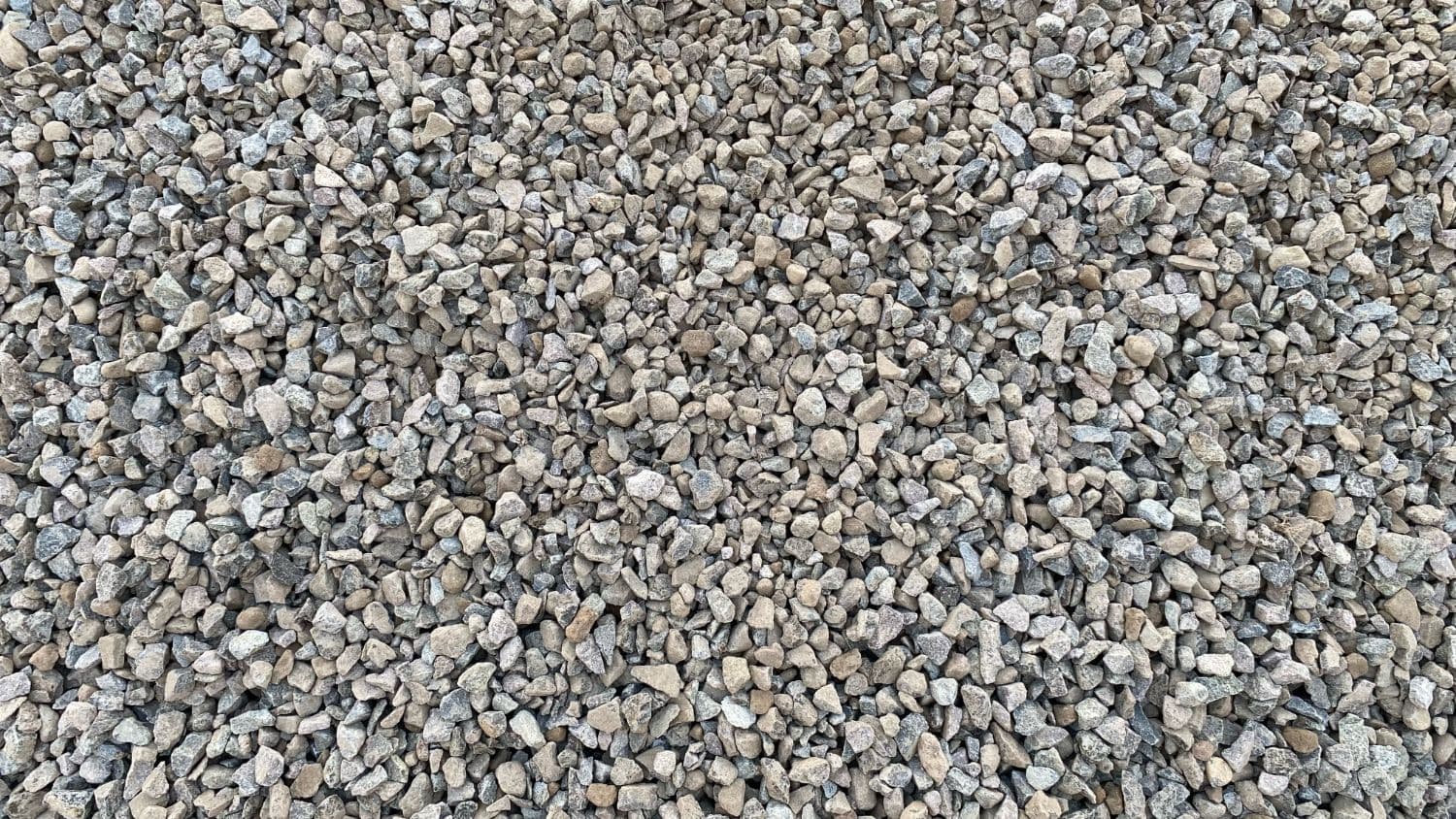 Close up of angular three quarter inch crushed stone, the alternative to crushed shell